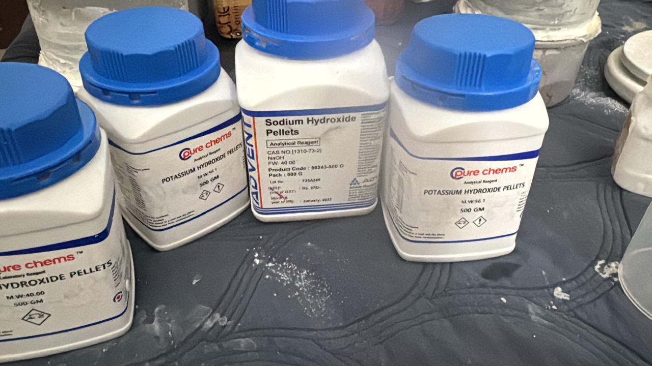 Jars of sodium hydroxide and potassium hydroxide